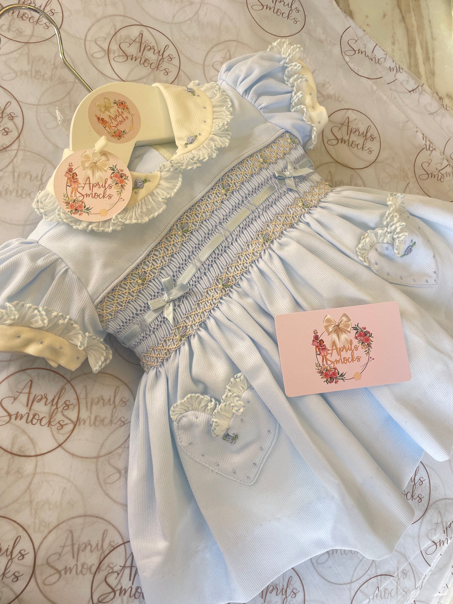 Girls Blue Smock Dress With Ribbon & Pearl Detail